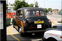 TQ3489 : 'Fairway' taxi at Tottenham Hale. by Dr Neil Clifton