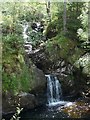 NH2200 : Waterfall on the Allt Ladaidh, Glengarry Forest by Claire Pegrum