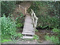 Footbridge at start of climb from stream