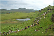 NG4162 : Lochan above the Fairy Glen by John Allan