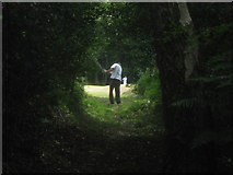 TQ4539 : Golfer on the bridleway by David Anstiss