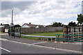 Grass where houses were before the bypass was built