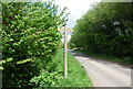 Footpath sign on Jackies Lane