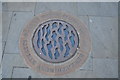 Decorative circular slab covering public well