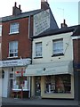 An old painted advert in East Street, Bridport