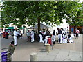 Morris Dancers preparing to perform in the High Street