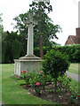 Celtic cross in St Mary The Great Church graveyard