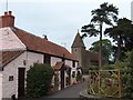 Church Path Cottage and St John