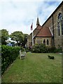 TQ1502 : Seat in the churchyard at St George's, East Worthing by Basher Eyre