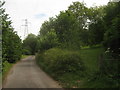 Bridleway and lane junction near Atchester Wood