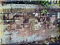 Benchmark at junction of Orton Road and Wigton Road