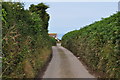 Looking down Sandy Lane towards property situated on a sharp left hand bend