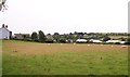 Sheep in a field backing up on Ffordd Bryn Cras Estate