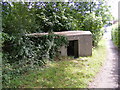 TM3877 : Pillbox on the footpath to Station Road by Geographer