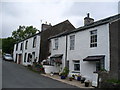 NY6208 : Whitewashed Cottages, Orton by Colin Smith