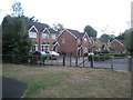 Looking from the play area in Douglas Gardens towards houses in Faber Close