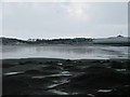 View of Low Newton by the Sea and the Coastguards station from the beach