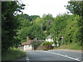 A4136 drops over the brow of the hill