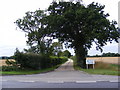 TM3867 : Lodge Lane the entrance to Lodge Farm by Geographer