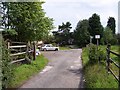 Public Footpath sign indicates the path at Fire Clay Farm