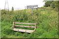 Ruined bench and sign for the Neil Gunn Memorial