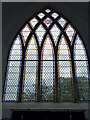 Inside St Peter, Westleton: tinted window