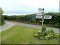 Floral road sign at The Lottery 1