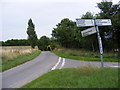 TM3162 : Road to Mill Green & North Green roadsign by Geographer