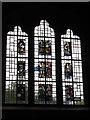 NY7863 : St. Cuthbert's Church, Beltingham - stained glass window by Mike Quinn