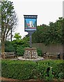 A sign and two seats, Old Woking