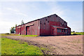 Large red shed near Redshead