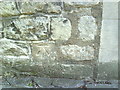 Benchmark on Merton College wall