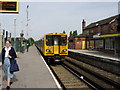 Class 507 No.507012 leaves Blundellsands & Crosby with a Southport service