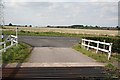 SK7384 : Cattle grid and track from Clarborough Hill Farm by roger geach