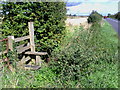 Stile at junction of road and footpath near Hewdon Farm