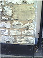 Benchmark on building on Ock Street near Crown Mews