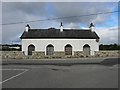 G9270 : Building with arched windows, Ballintra by Kenneth  Allen