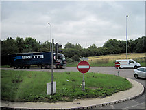SP5578 : Roundabout on A14 just before M1 bridge by John Firth