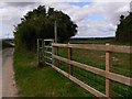 Footpath across fields leaves lane