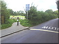 Junction of Pymore Road with pavement