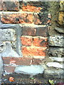 Benchmark on wall outside #59 Spring Road