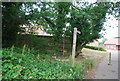 Footpath sign at the end of Wyphurst Rd