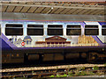 Passenger carriage advertising the sights of Yorkshire, Harrogate Station