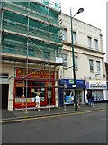 SZ0991 : Scaffolding on a takeaway in Old Christchurch Road by Basher Eyre