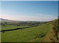 View south-westwards across farmland from the Rhos Goch road