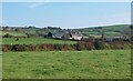 View across grazing land towards Fferm Tynewydd, Llaniestyn