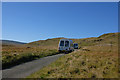 SH8232 : Minivans on the mountain road by Nigel Brown
