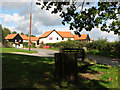 Seat on the green beside Pound Hill, Saham Toney