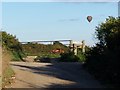 Lane, fence and hot air balloon