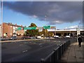 Heavy clouds form over road sign gantry at the Rocket